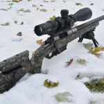 Proof Barreled Mesa Precision Arms Rifle in the snow.