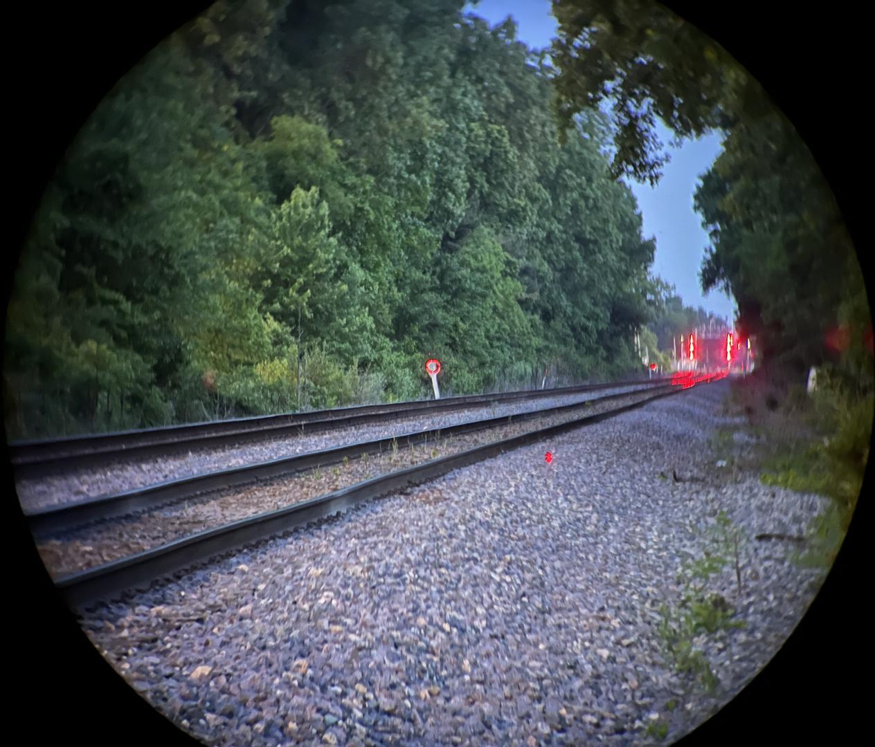 Determining reticle / beam alignment of the Leica Geovid 8x32 Pro binos using a sign at about 280 yds.