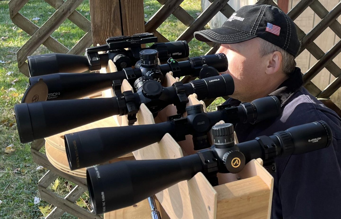 One of the optical test lineups. From back to front: Sig Tango 6 5-30x56, Sightron S6 5-30x56 FFP IR, Leupold Mark 5HD 5-25x56, Sightron SIIISS624x50LRFFP/MH, Athlon Midas TAC 5-25x56