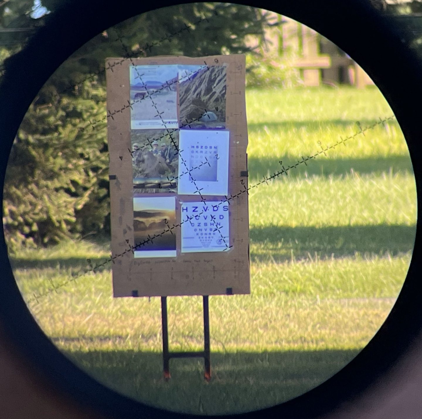 Optical test target through the Leupold Mark 4HD 4.5-18x52mm in the v-block