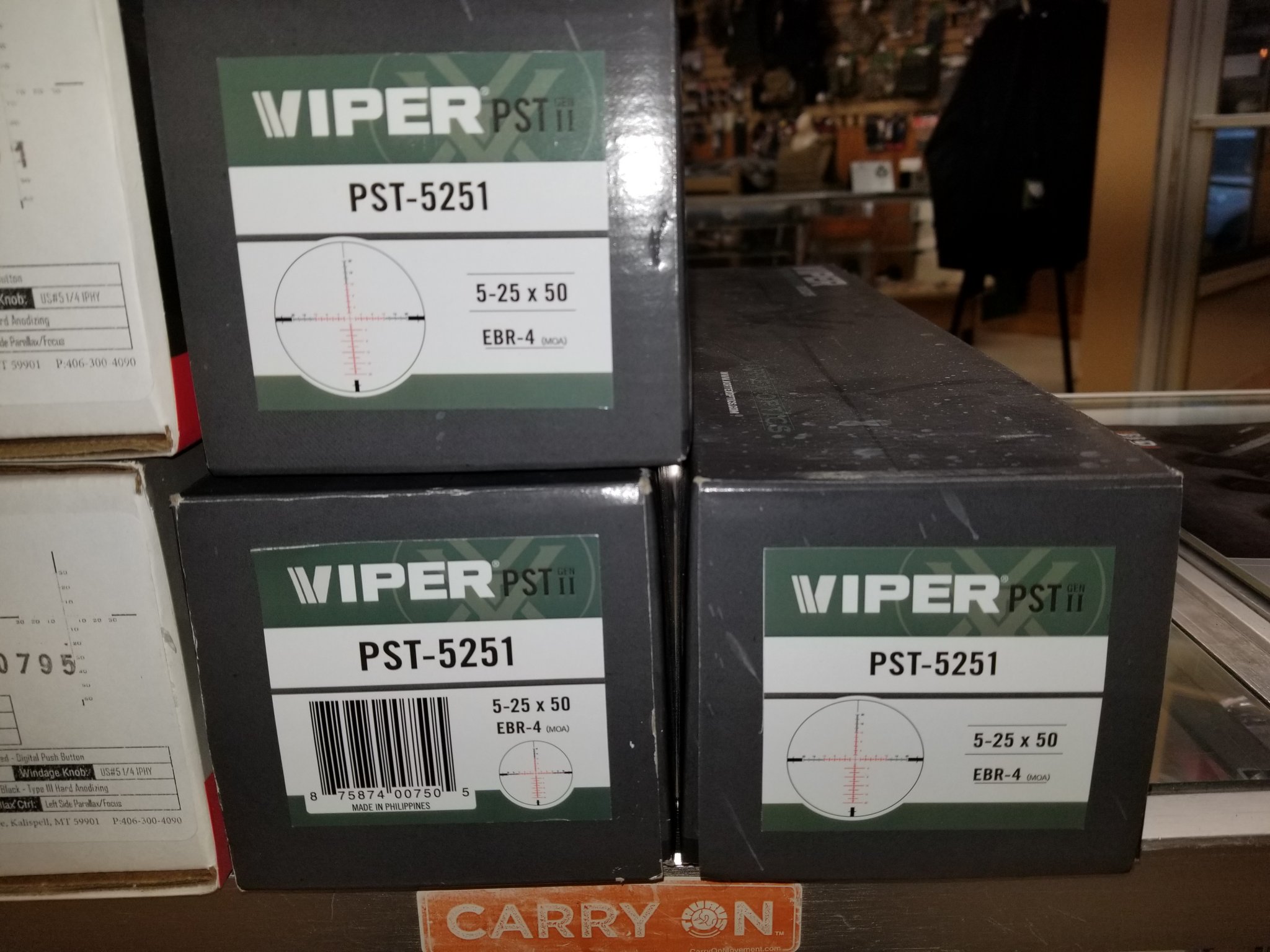 6974128
