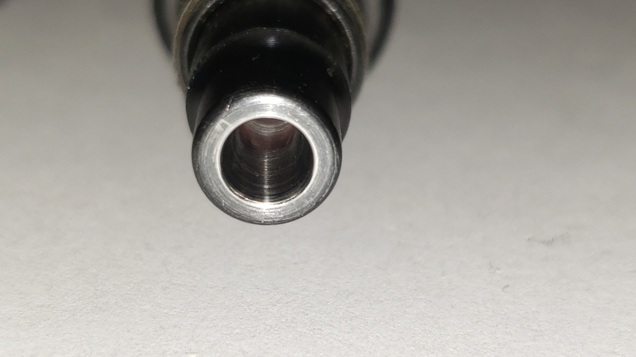 7050454