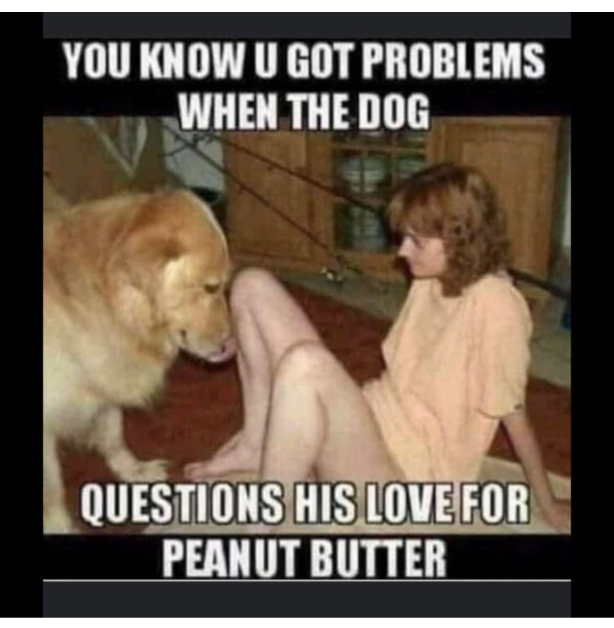 Dog licking peanut butter off dick