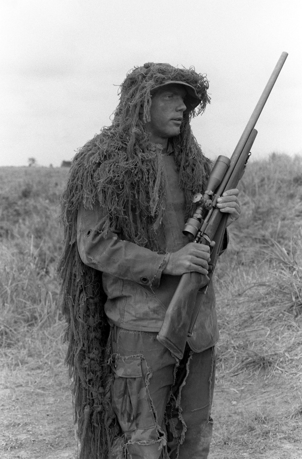 a-camouflaged-marine-holds-a-snipers-rifle-491093-1600.jpg