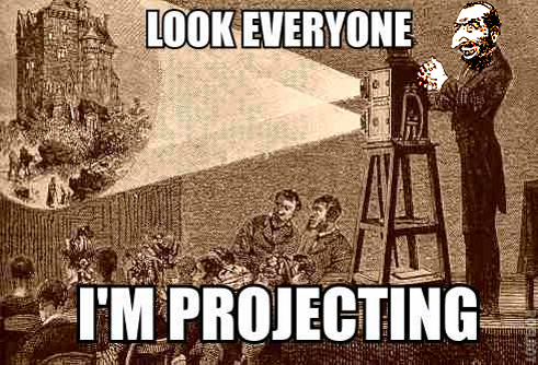 7056497
