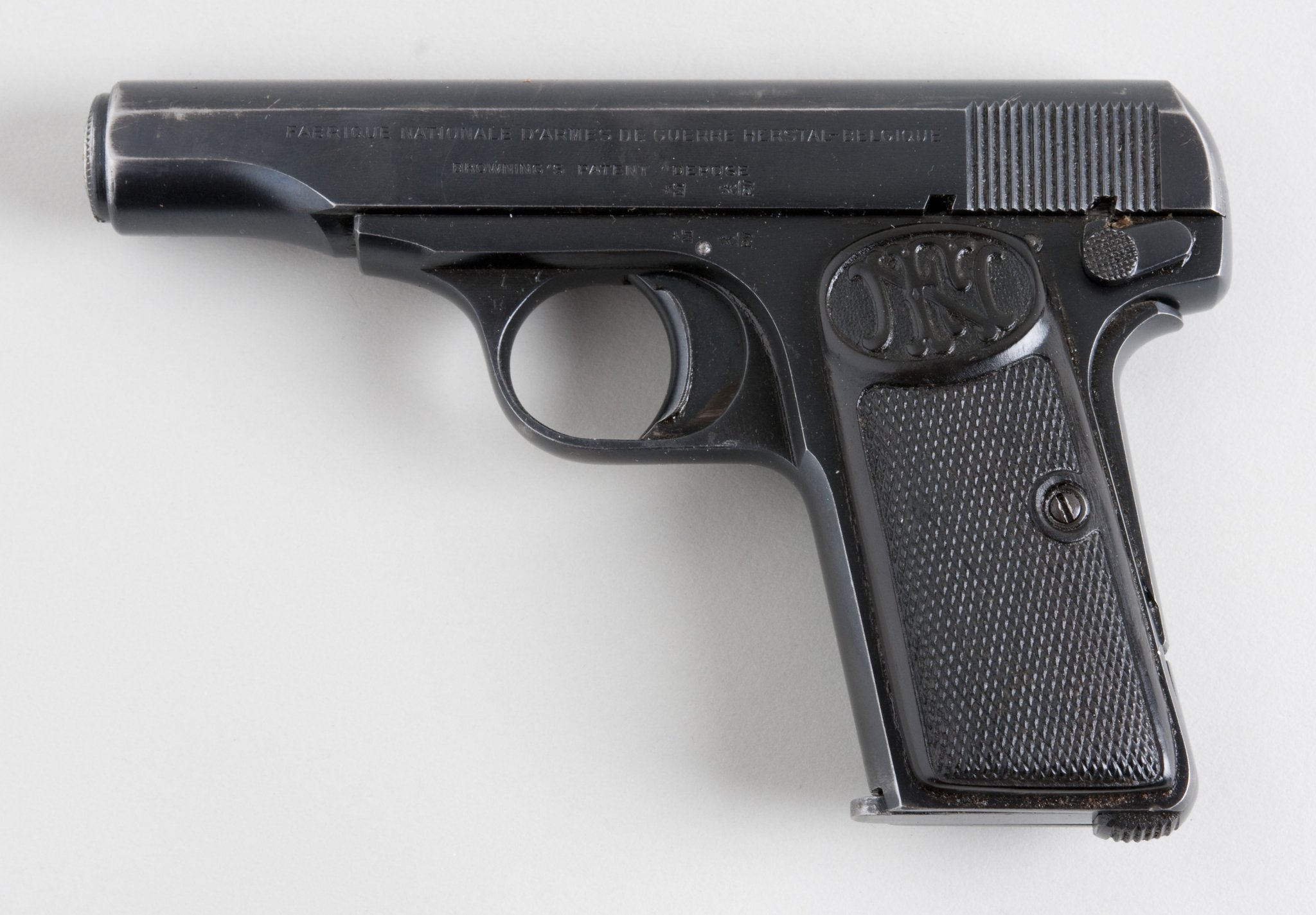 Browning_1910_(6971783833).jpg