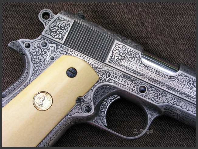 Colt_1911_Combat_Commander_.45.JPG