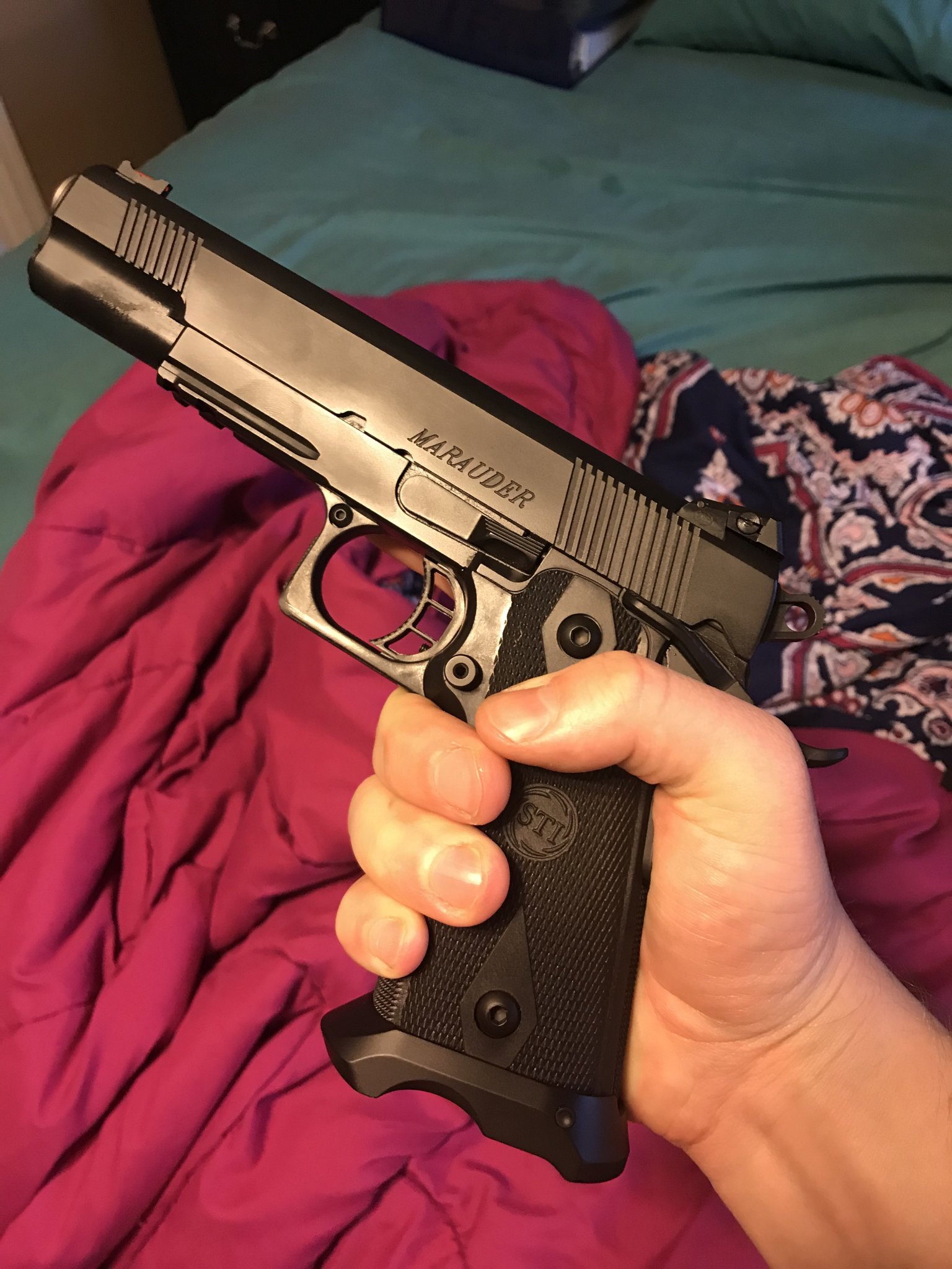 7043740