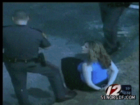 funny-gifs-copper-just-kicking-it.gif