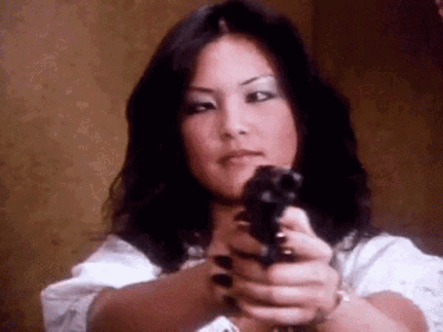 gun-cross-eyed.gif