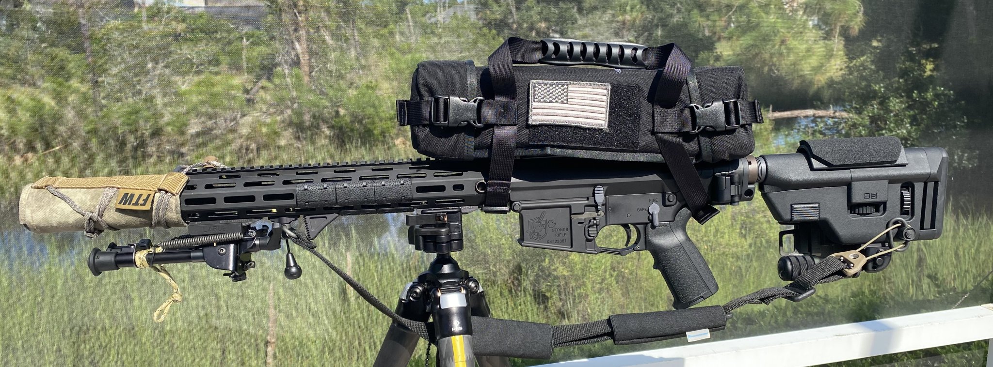 IMG_0165KAC SR-25 WITH SUPPRESSOR BLACK SCOPE & SLING RMR MOUNTED POOLSIDE 07.30.21 copy.jpg