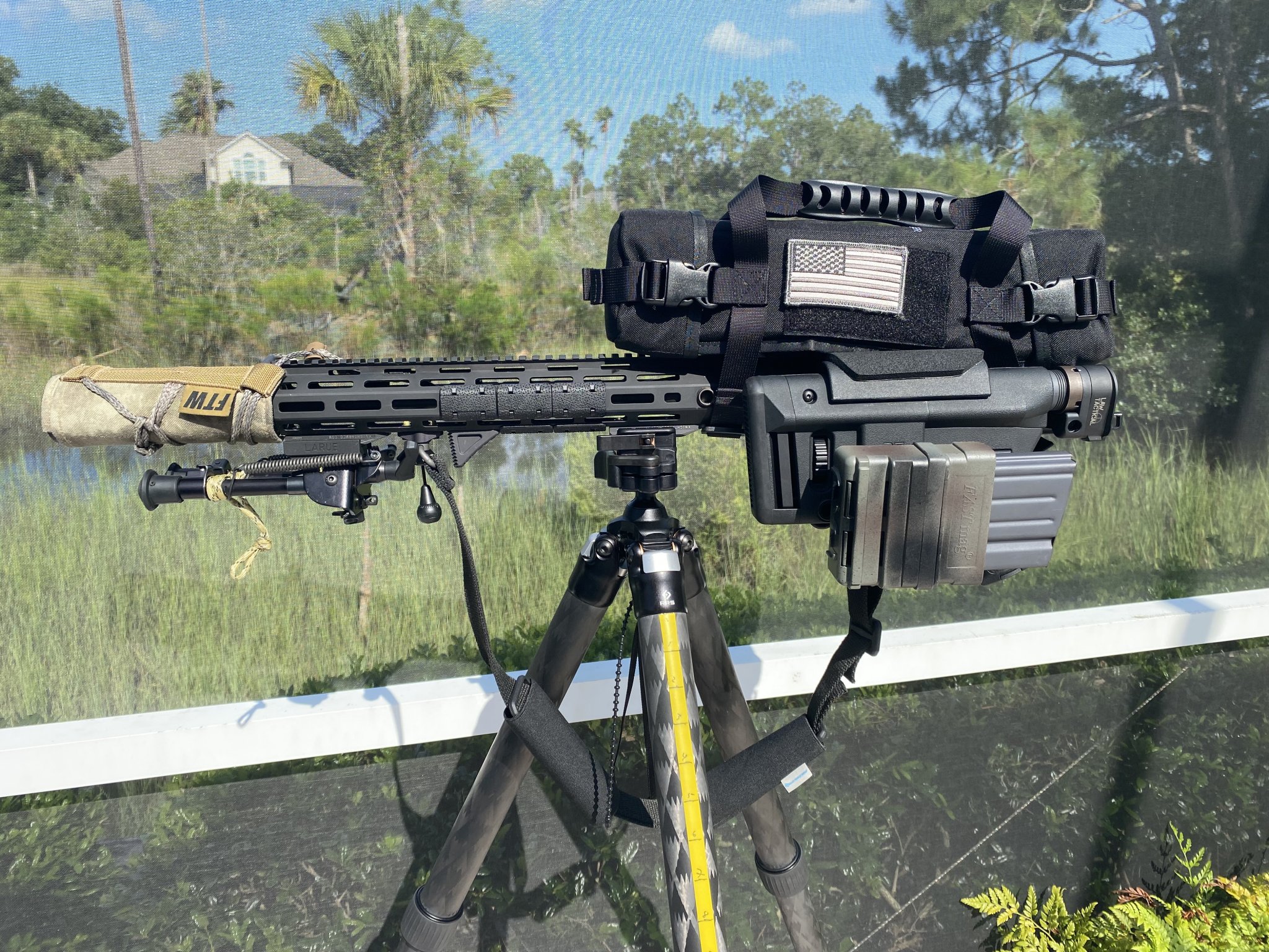 IMG_0166KAC SR-25 WITH SUPPRESSOR BLACK SCOPE & SLING RMR MOUNTED POOLSIDE 07.30.21 copy.jpg