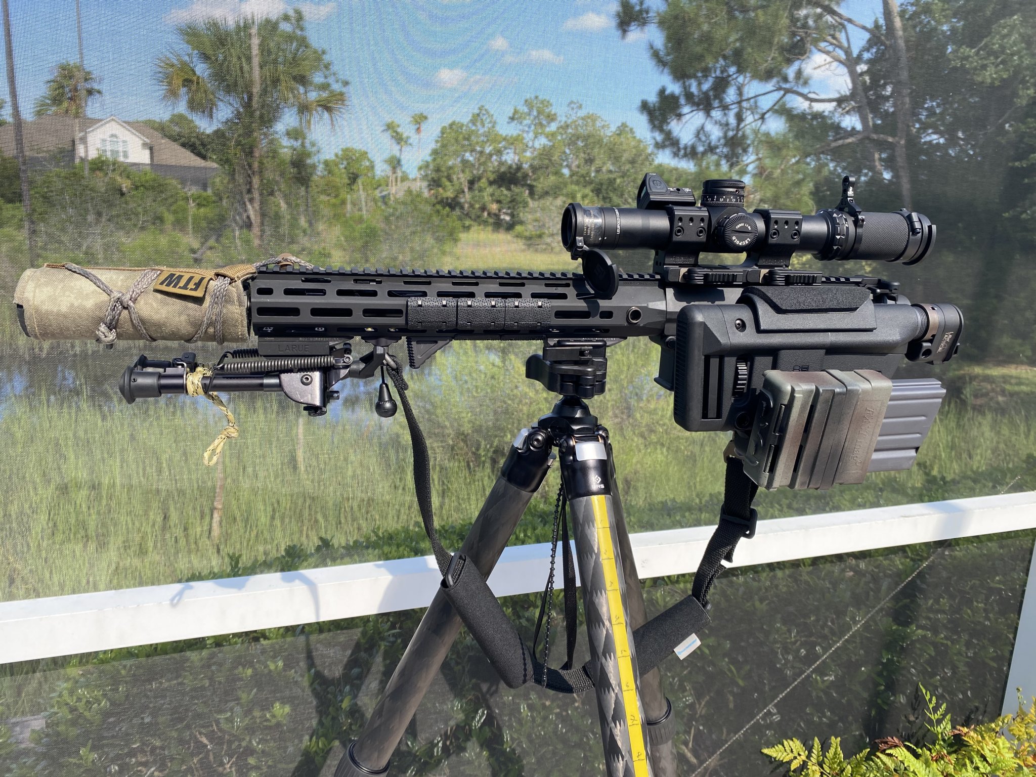 IMG_0176KAC SR-25 WITH SUPPRESSOR BLACK SCOPE & SLING RMR MOUNTED POOLSIDE 07.30.21 copy.jpg