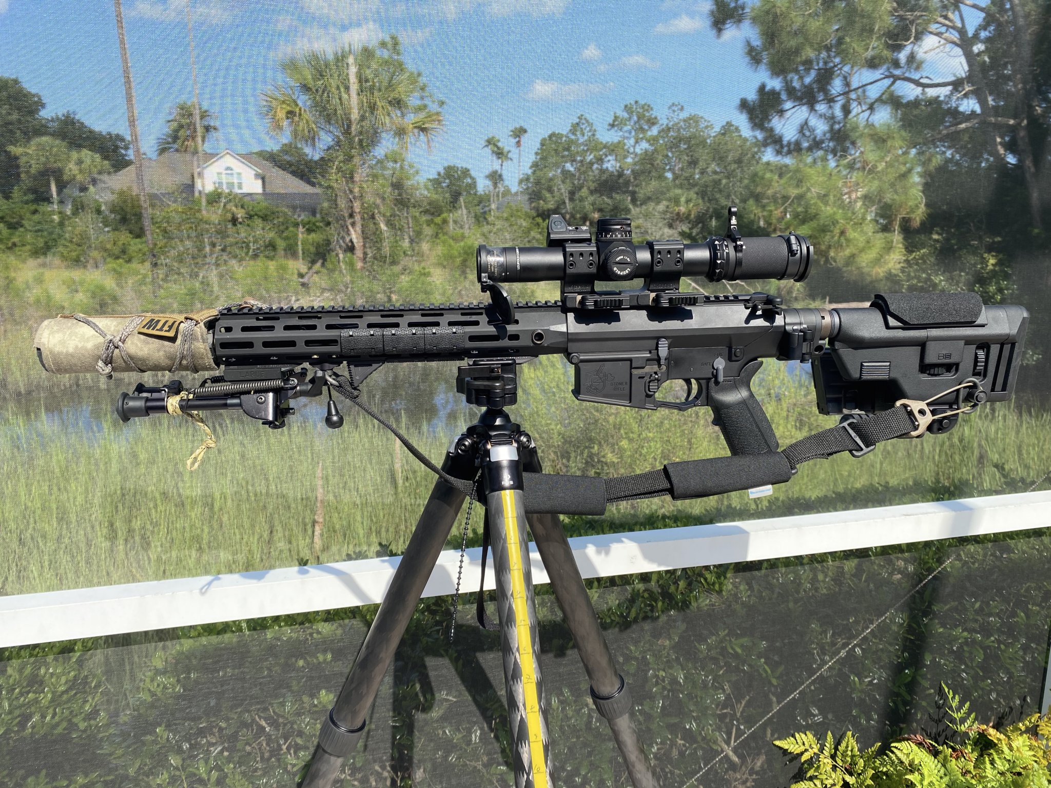 IMG_0177KAC SR-25 WITH SUPPRESSOR BLACK SCOPE & SLING RMR MOUNTED POOLSIDE 07.30.21 SERIAL NO ...jpg