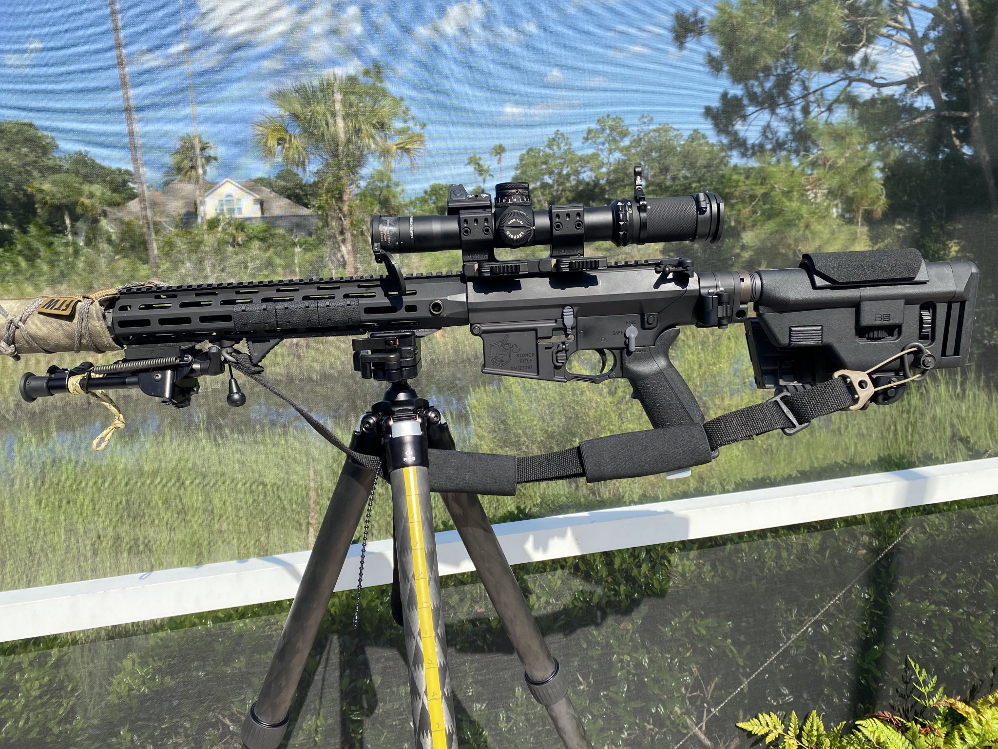 IMG_0179KAC SR-25 WITH SUPPRESSOR BLACK SCOPE & SLING RMR MOUNTED POOLSIDE 07.30.21 copy.jpg