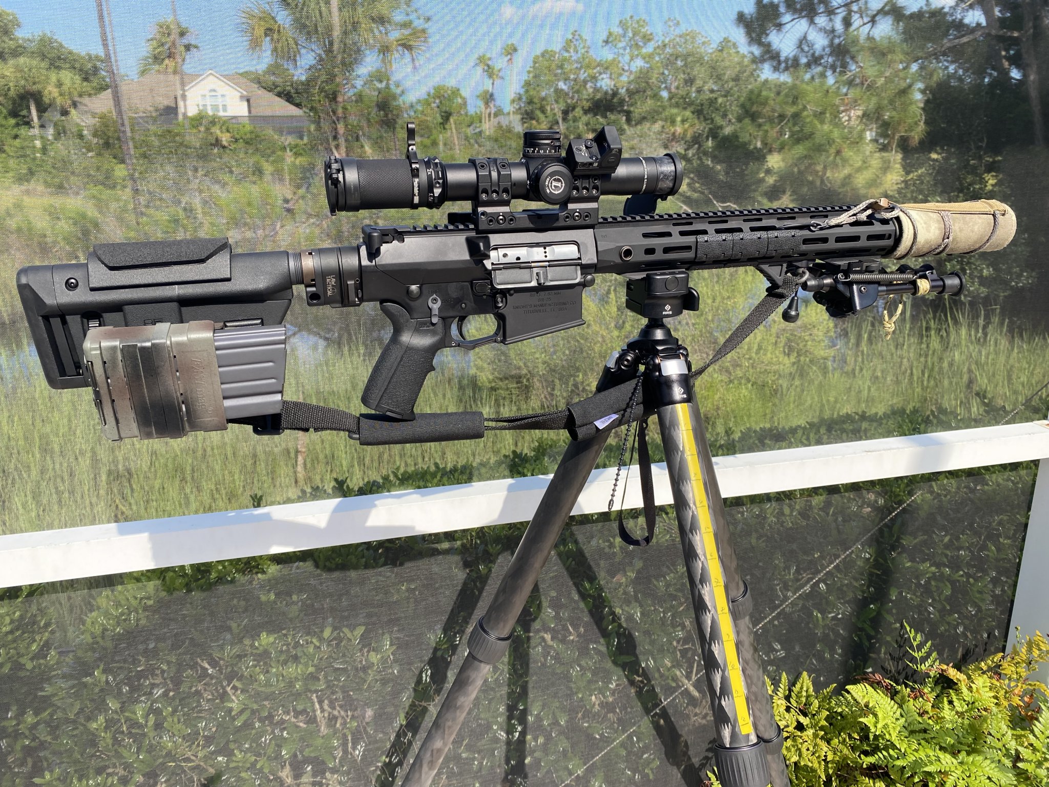 IMG_0181KAC SR-25 WITH SUPPRESSOR BLACK SCOPE & SLING RMR MOUNTED POOLSIDE 07.30.21 copy.jpg