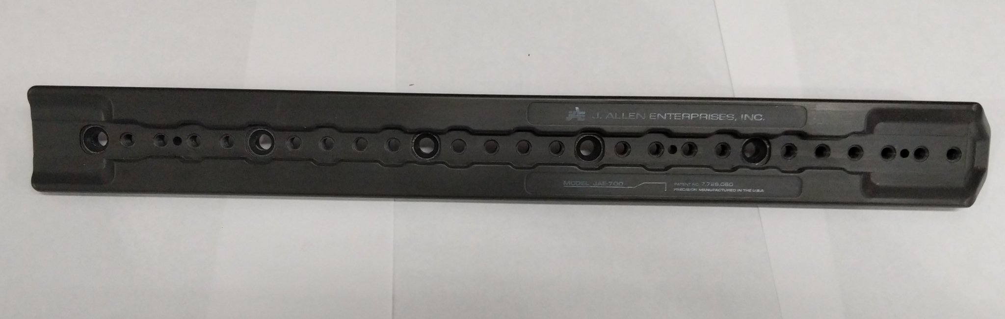 7037005