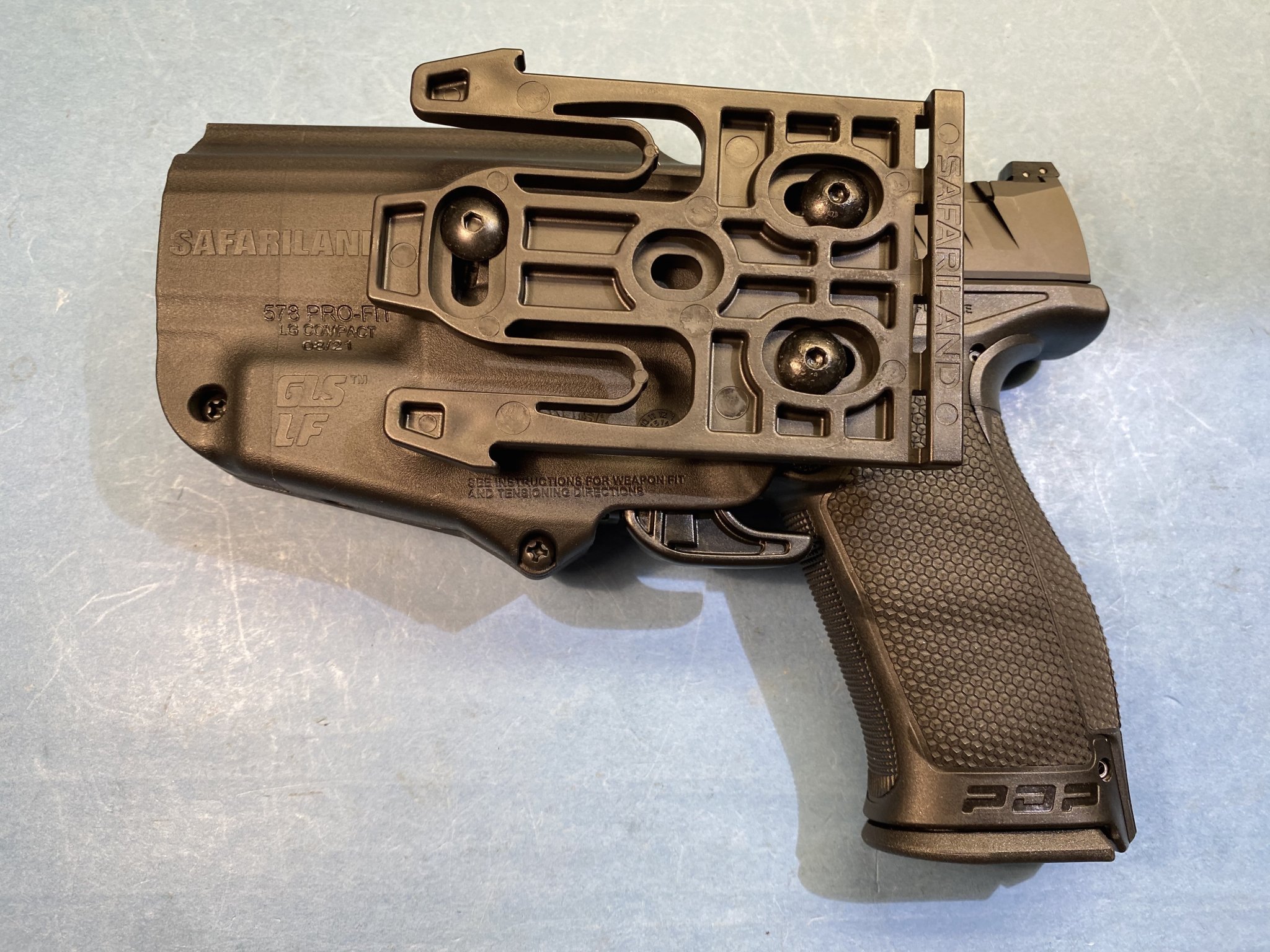 IMG_8347Walther PDP with Safariland GLS Holster QLS and Hip Paddle Mounts 2021 copy.jpg