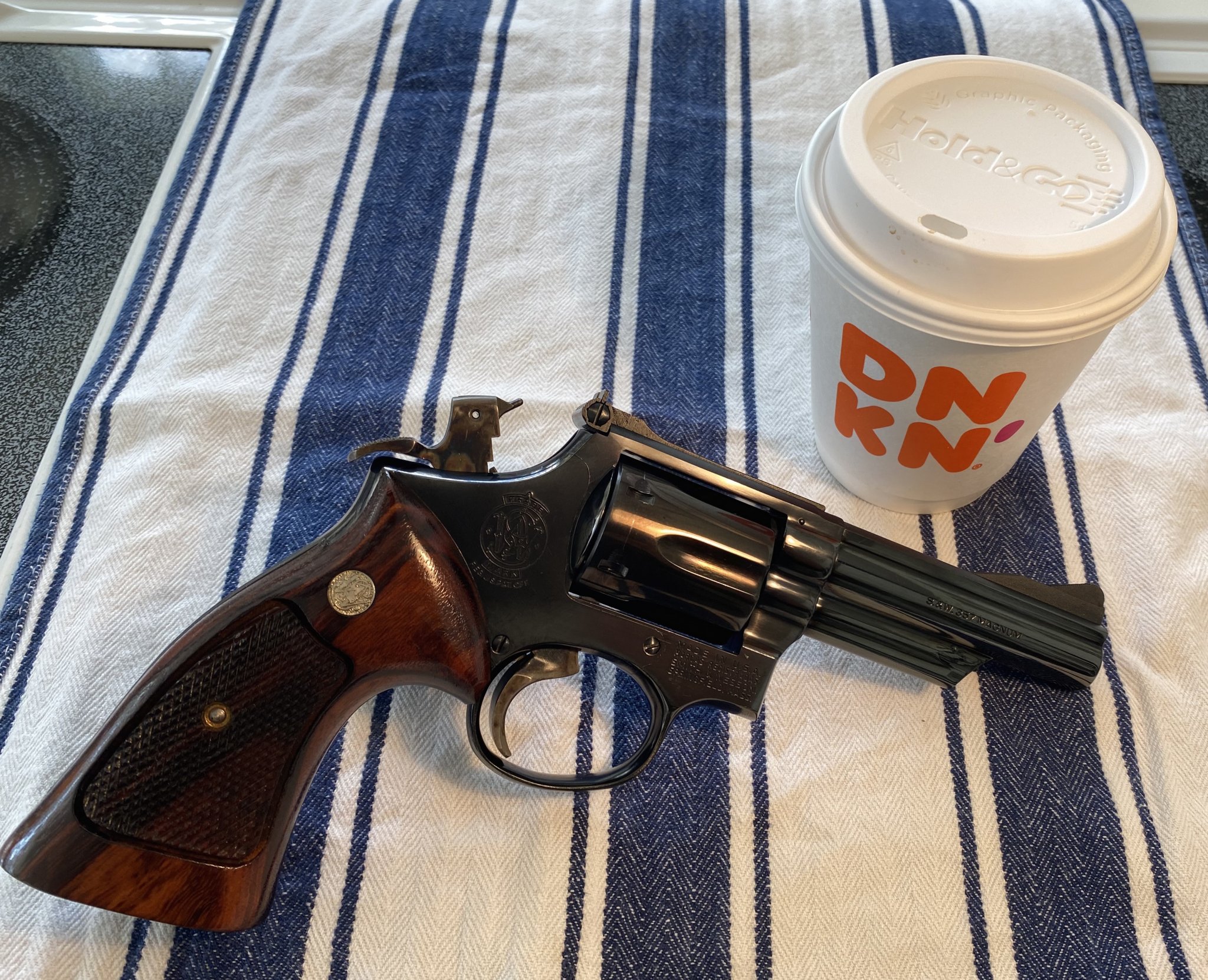IMG_8495Smith & Wesson Model 19-3 .357 Mag 4 Barrel Guns with Coffee Photos 03.13.21.jpg