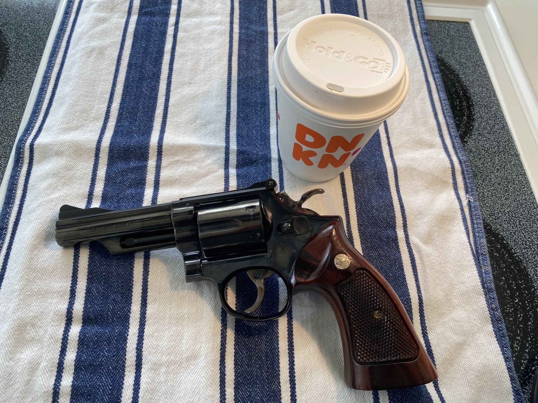 IMG_8497Smith & Wesson Model 19-3 .357 Mag 4 Barrel Guns with Coffee Photos 03.13.21.jpg