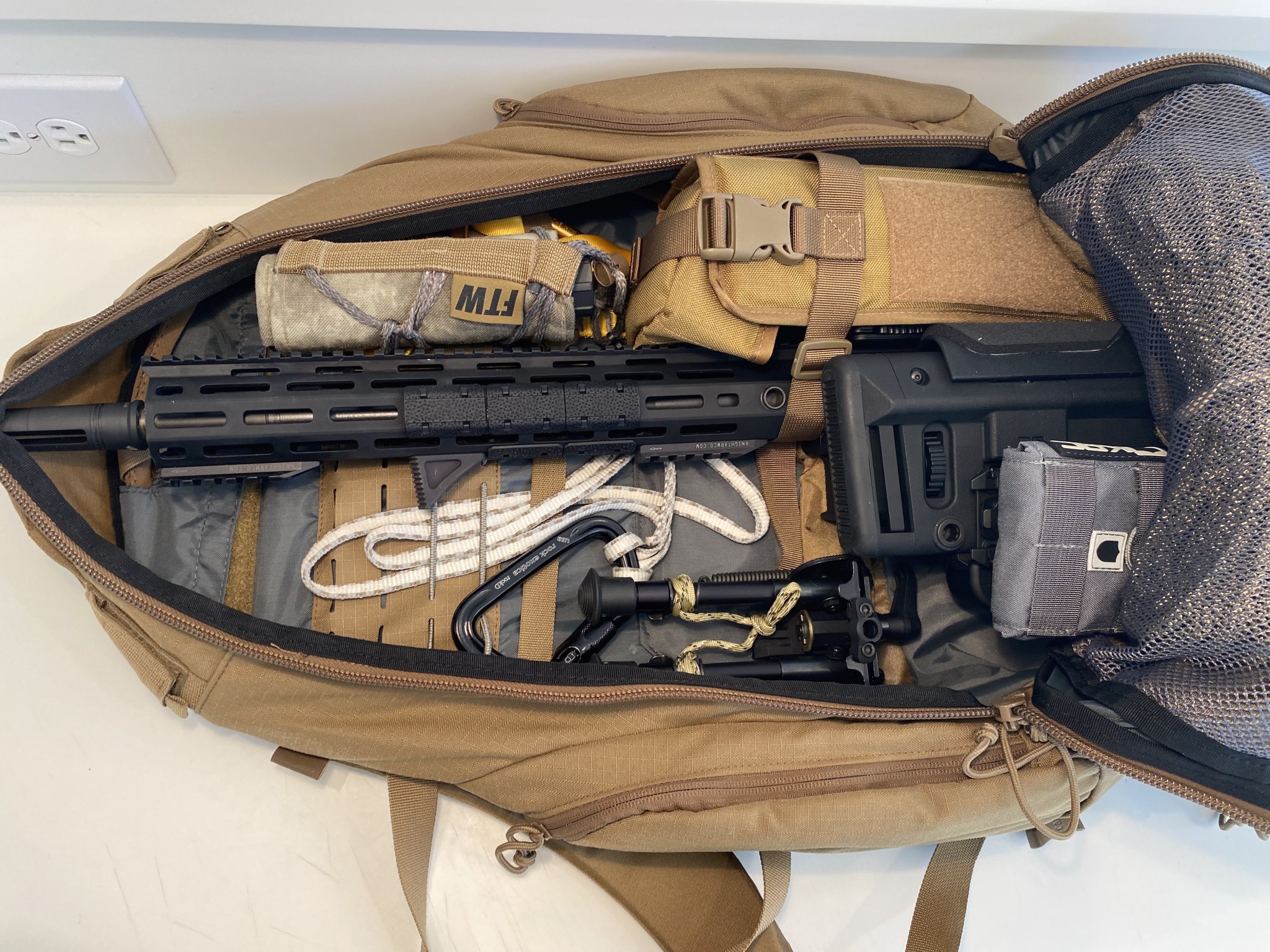 IMG_9902KAC SR25 FOLDED IN CAMELBACK PACK 07.10.21.jpg