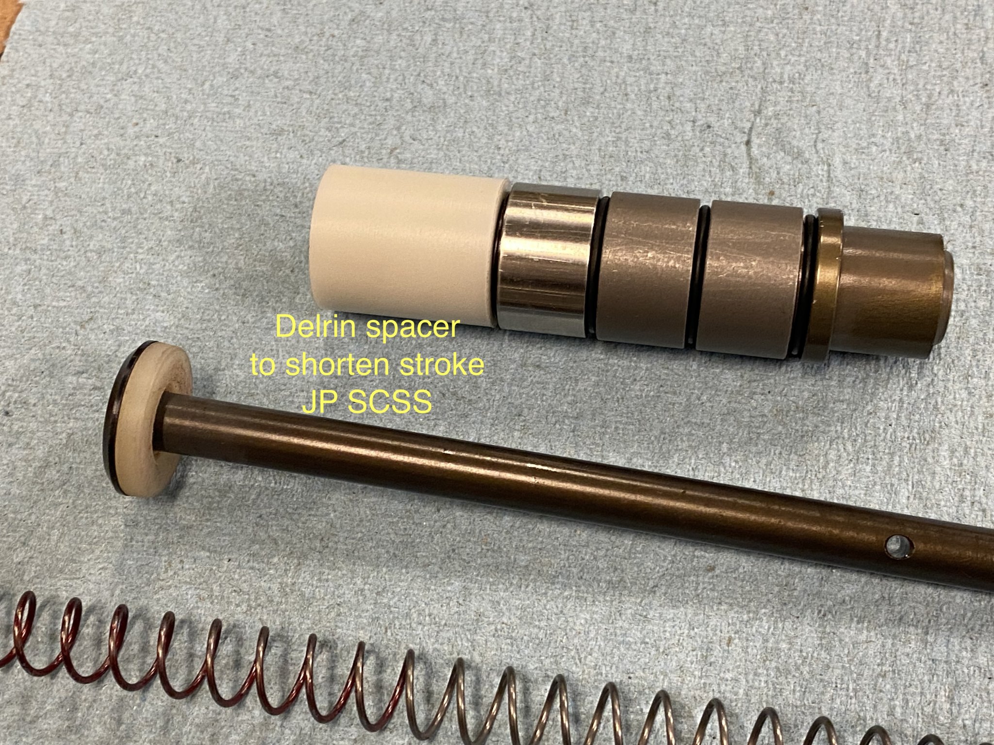 IMG_9975Wilson Combat 6.8 SPC 2 JP SCSS  LawH2 Delrin Spacer Fabrication 02.17.24 copy.jpg