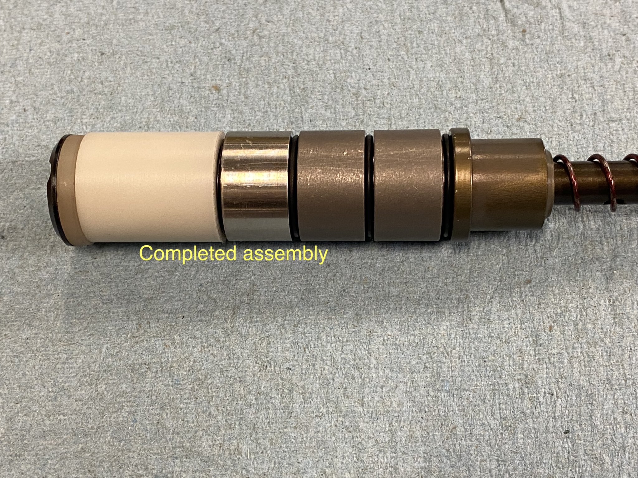 IMG_9976Wilson Combat 6.8 SPC 2 JP SCSS  LawH2 Delrin Spacer Fabrication 02.17.24 copy.jpg