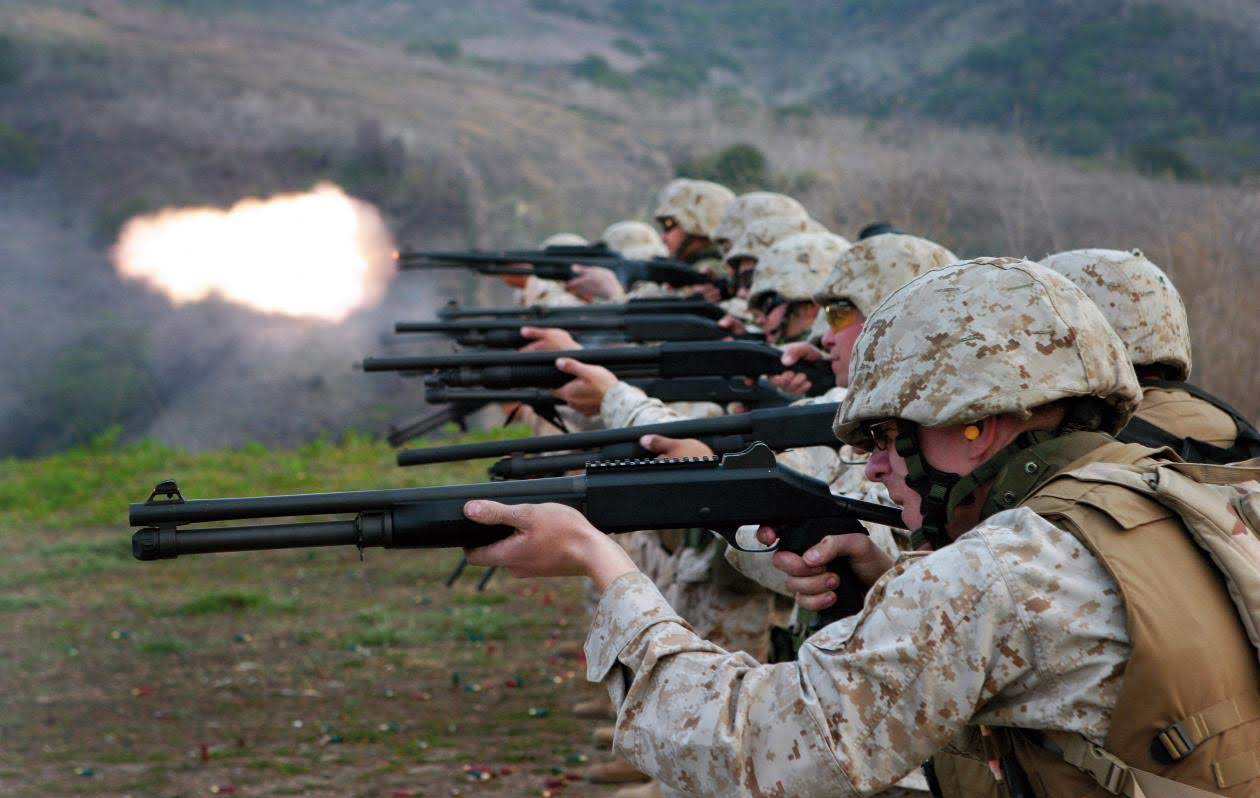 marinesonthefiringlinewiththeirshotguns.jpg