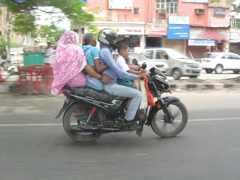 new-delhi-india-june-indian-family-four-riding-motorcycle-185215095.jpg