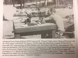 picture of SOTIC instructor Sfc Thomas Kapp using a M25 with 3-color forest camo stock along w...jpg