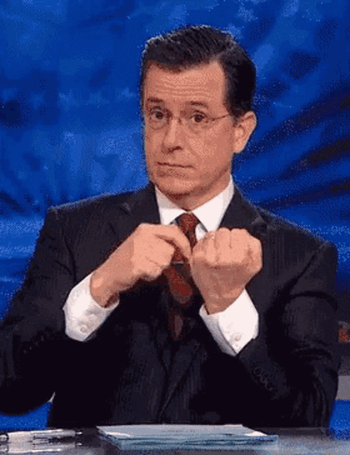 stephen-colbert-middle-finger.gif