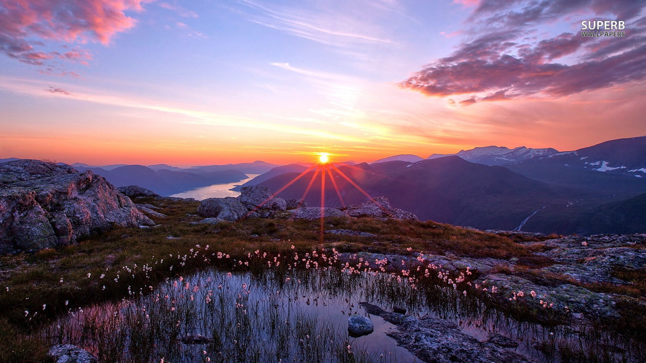 sunrise-over-the-mountains-17063-1280x720.jpg