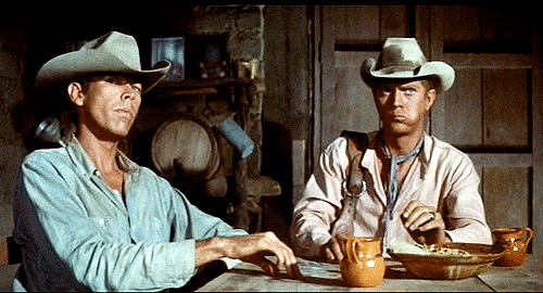 the-magnificent-seven1960-james-coburn-and-steve-mcqueen.gif