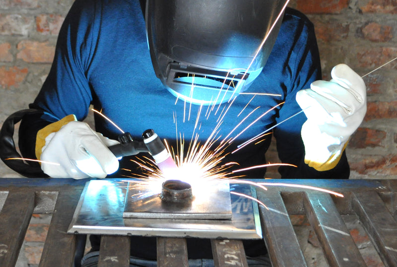 TIG-Welder-Welds-Metal-Using-Tig-W-250102327_800x.jpg
