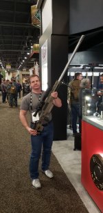 Frank at Shot Show with 40cal rifle.jpg
