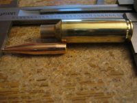6.5 sst brass and bullet.jpg