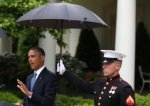 marines-hold-umbrellas-over-u-s-president-barack-obama3.jpg