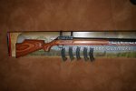 TC R55 BENCHMARK .22 LR WITH LEUPOLD BASE AND RINGS 300.00.jpg